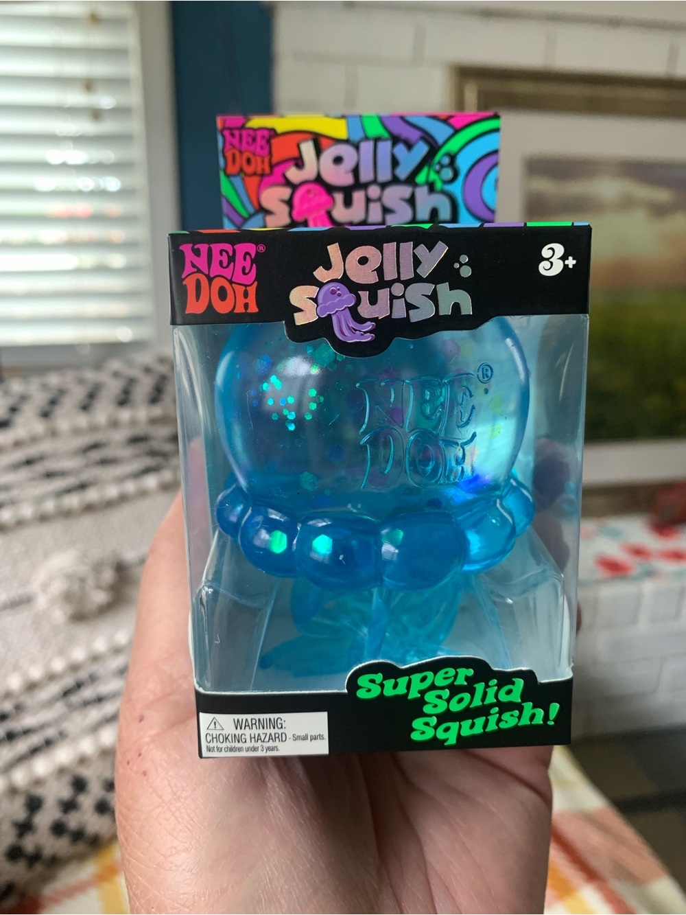 NeeDoh (Schylling) Jelly Squish Sensory Toy shaped like a Blue Jellyfish, New